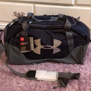 Under Armour navy blue duffel bag